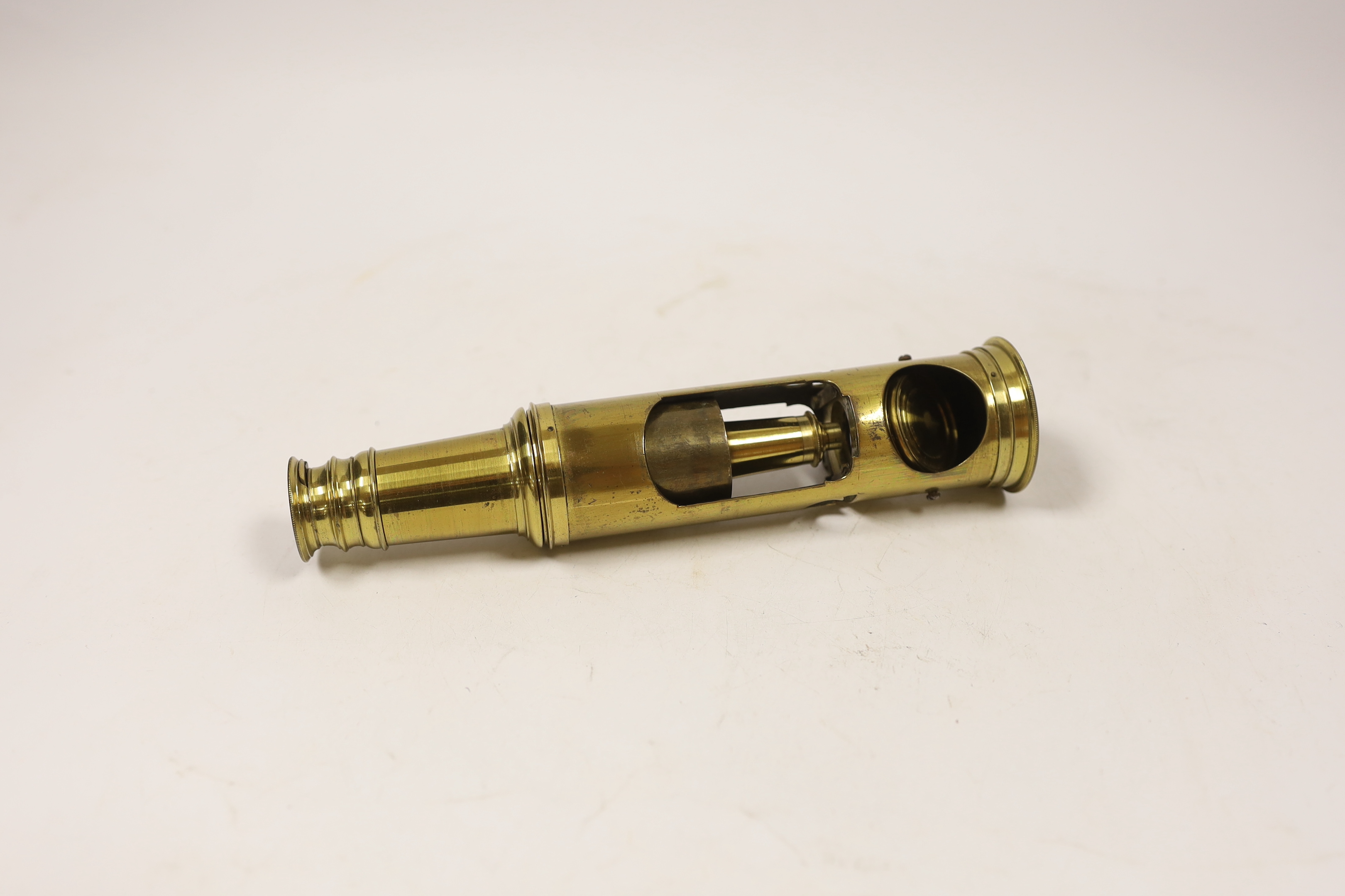 A boxed brass ‘drum’ style field microscope, in a fitted case, microscope 19cm high